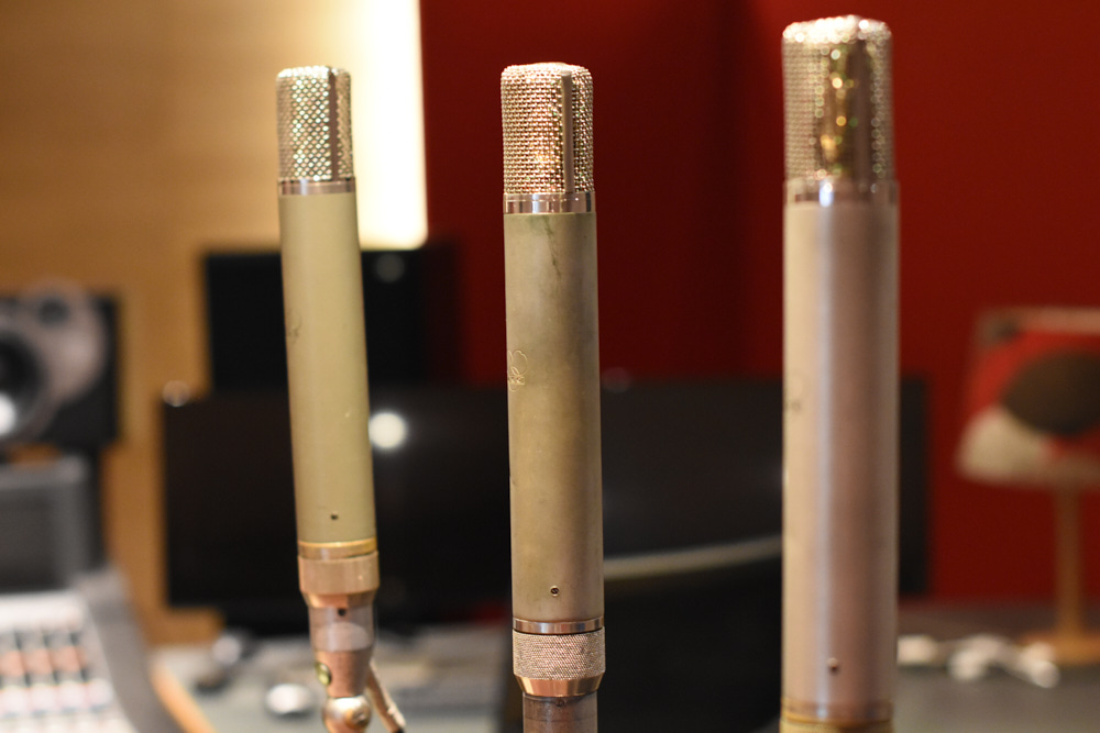 Three AKG C12 valve microphones