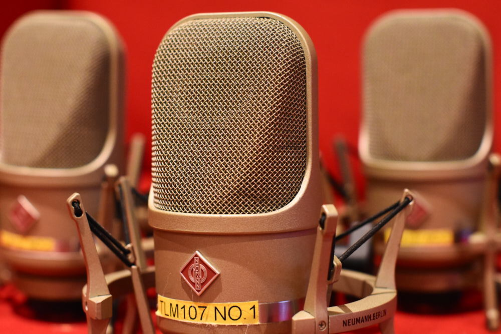 Three Neumann TLM107 microphones